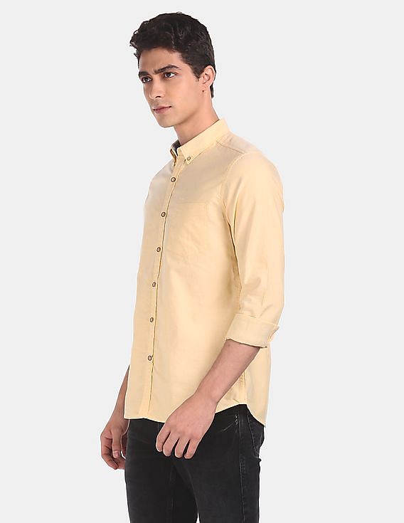 light yellow button up shirt