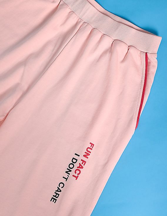 Baby Pink Track Pants with Typographic Detailing  Crimsoune Club