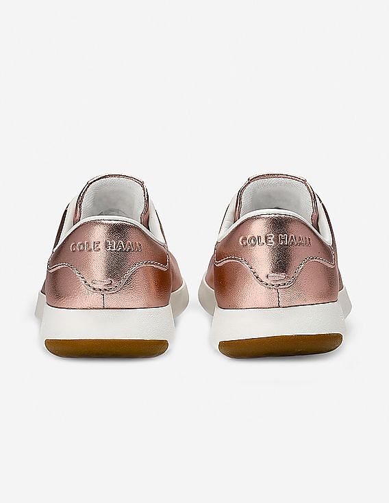 Cole haan rose sales gold sneakers