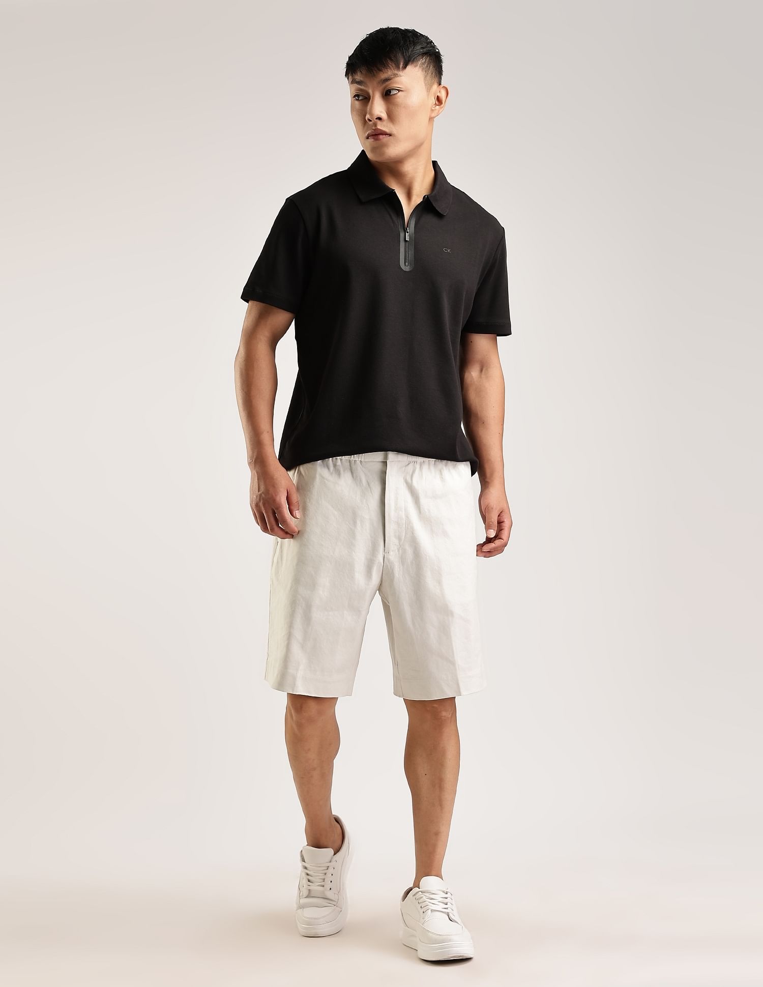 Calvin Klein Jeans Solid Regular-Fit Cotton Polo T-Shirt