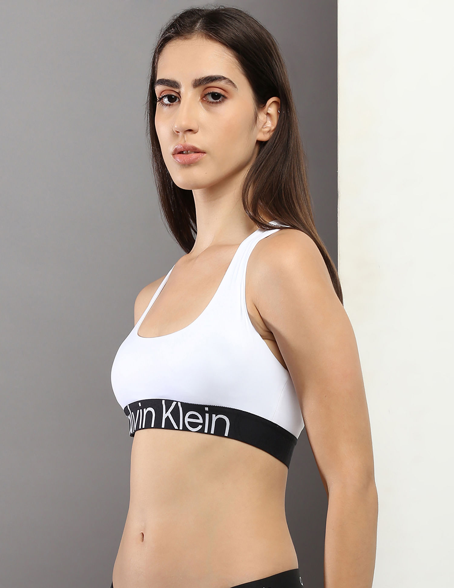 Buy Calvin Klein Underwear Medium Support Logo Under Band Sports Bra 