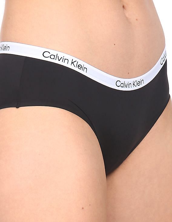 Buy Calvin Klein Women's Regular Plain/Solid Stretch Mid-Rise Lace Band  Flirty Hipster Brief (F3788_Black_Small) at