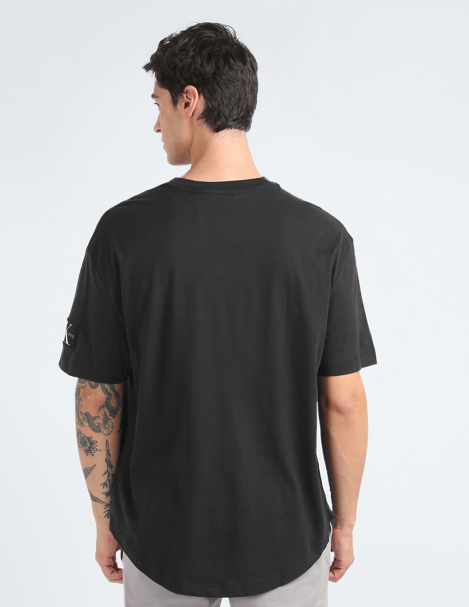 Calvin Klein Jeans monogram chest logo oversized t-shirt in black