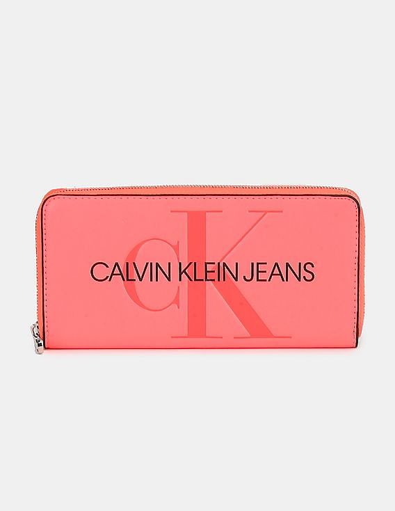 CALVIN KLEIN COLLECTION Orange Textured Leather Pouch Bag For Sale at  1stDibs
