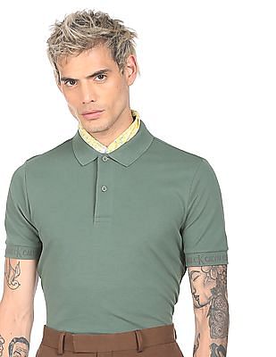 Calvin Klein Men Green Ribbed Collar Solid Polo Shirt