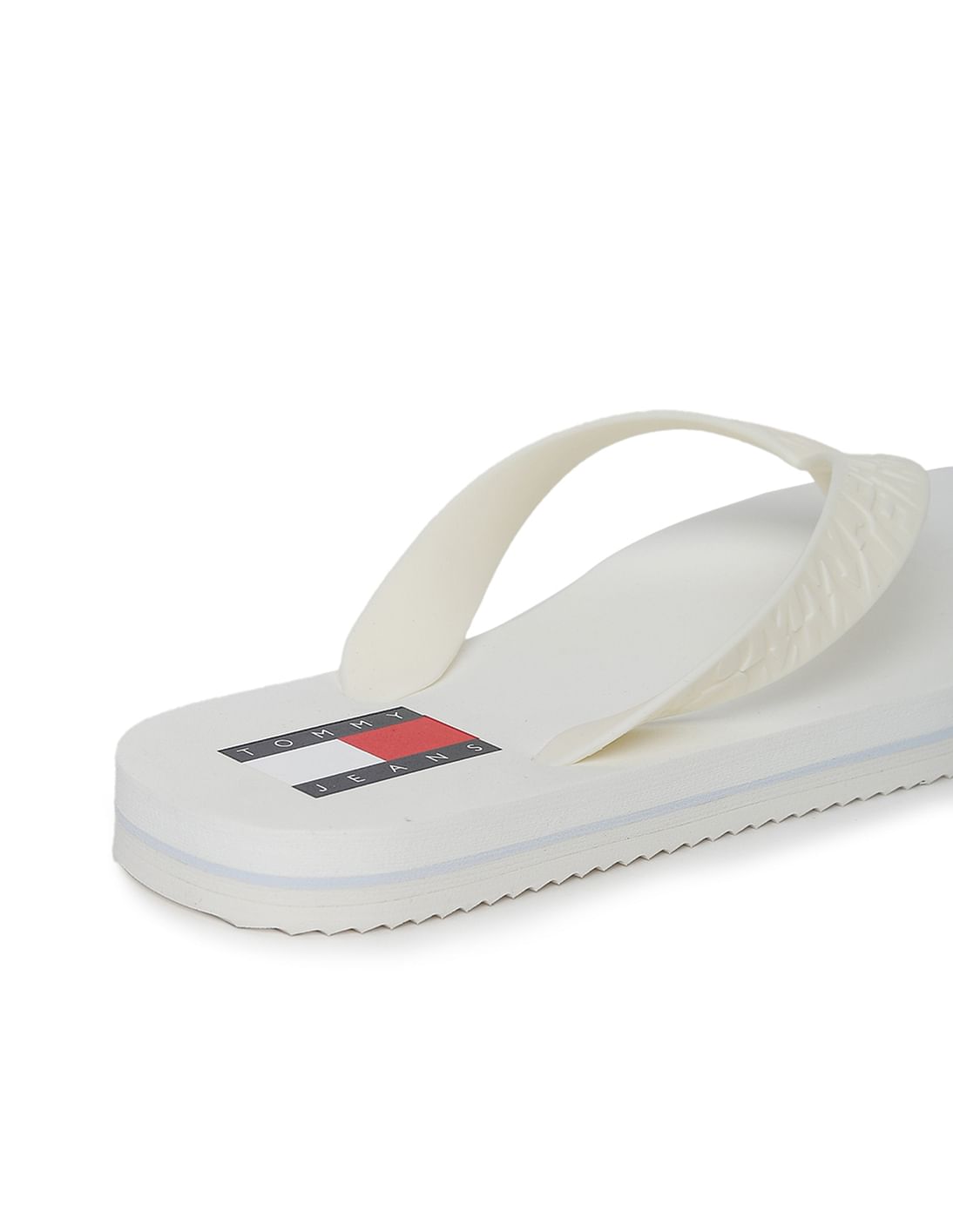 Buy Tommy Hilfiger Women Brand Embossed V Strap Flip Flops NNNOW