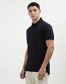 Tommy Hilfiger Solid Logo Slim Fit Polo Shirt