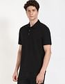 Calvin Klein Jeans Striped Regular-Fit Polyester Polo T-Shirt