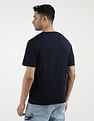 Tommy Hilfiger Graphic Signature Print Twist T-Shirt