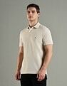 Tommy Hilfiger Solid Regular Fit Cotton Polo T-Shirt