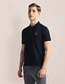 U.S. Polo Assn. Ribbed Collar Solid Polo Shirt